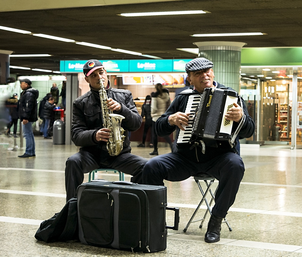 the musicians accordion saxophone free photo