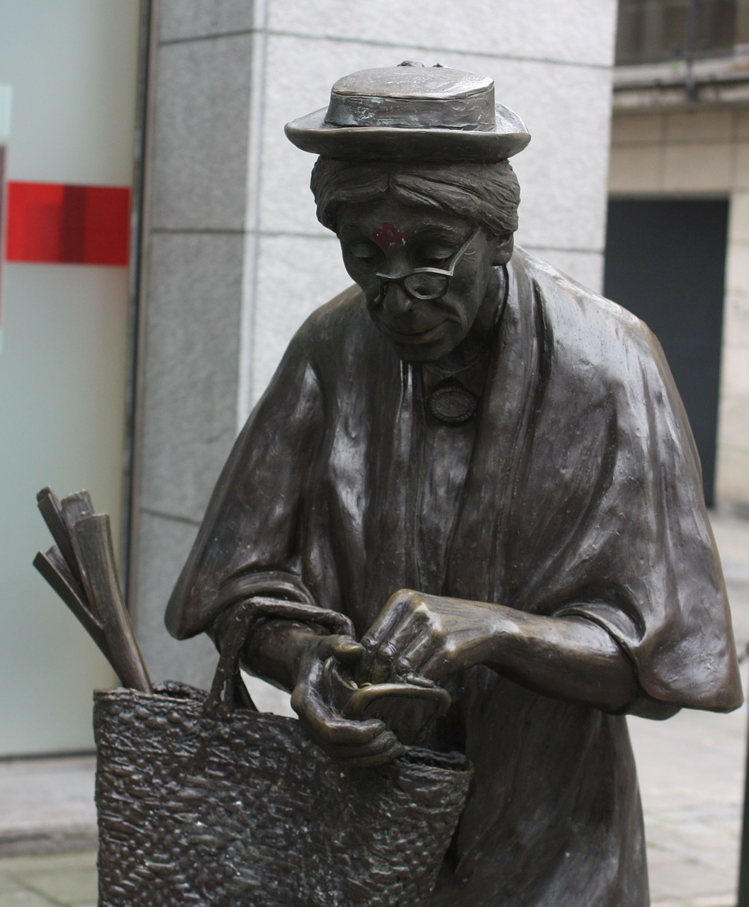 the old lady sculpture brussels free photo