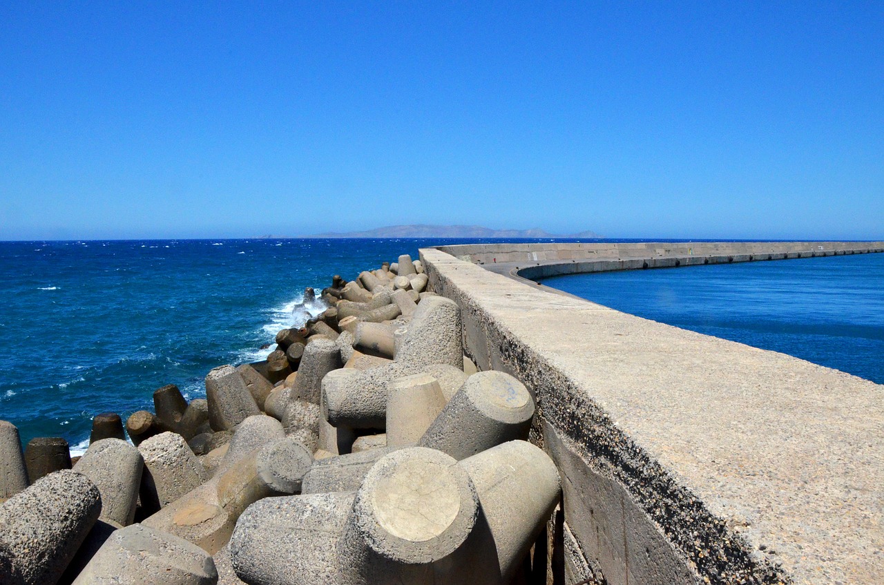 the pier breakwater beach free photo