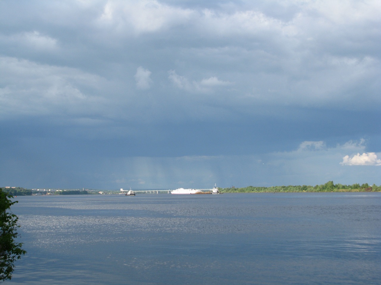 the river kama  blue sky  dark clouds free photo