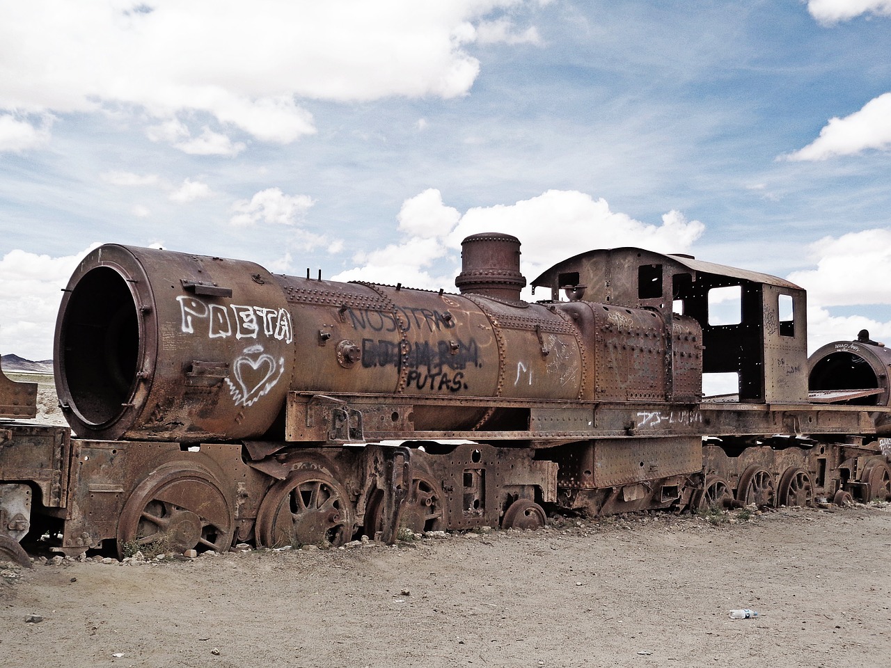 the salar de uyuni cemetery of trains bolivia free photo