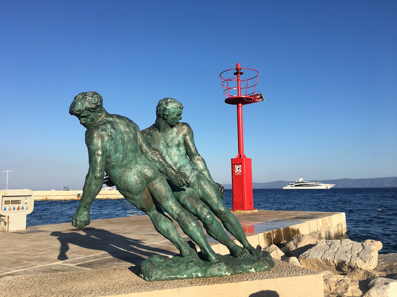 the statue  port  croatia free photo