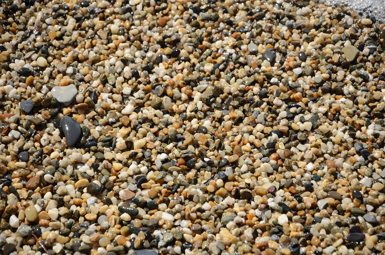 the stones pebbly beach the background free photo