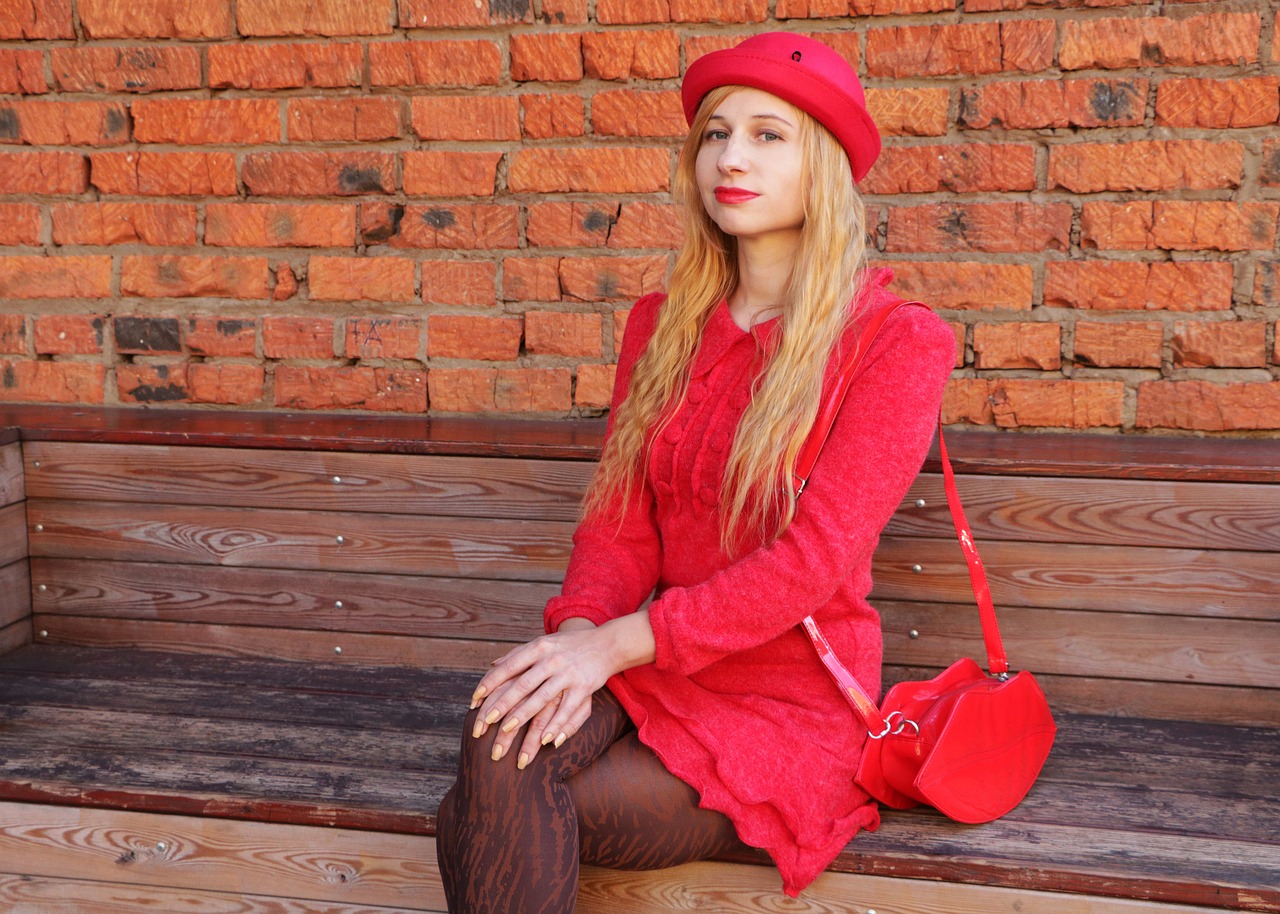 the woman in red  lady in red  woman in hat free photo