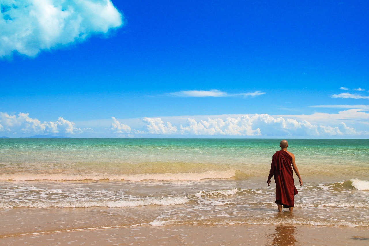 theravada buddhism monk at beach beach free photo