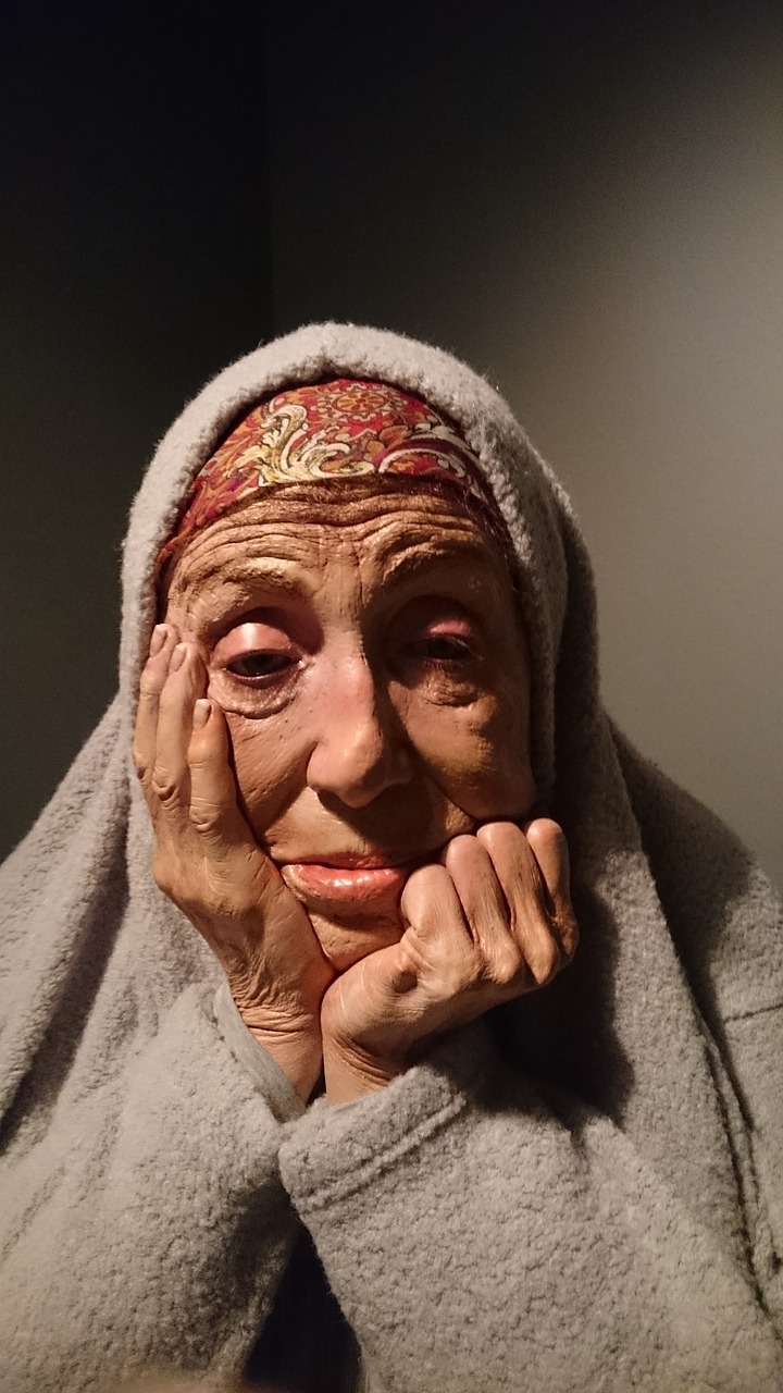 thoughtful older woman free photo