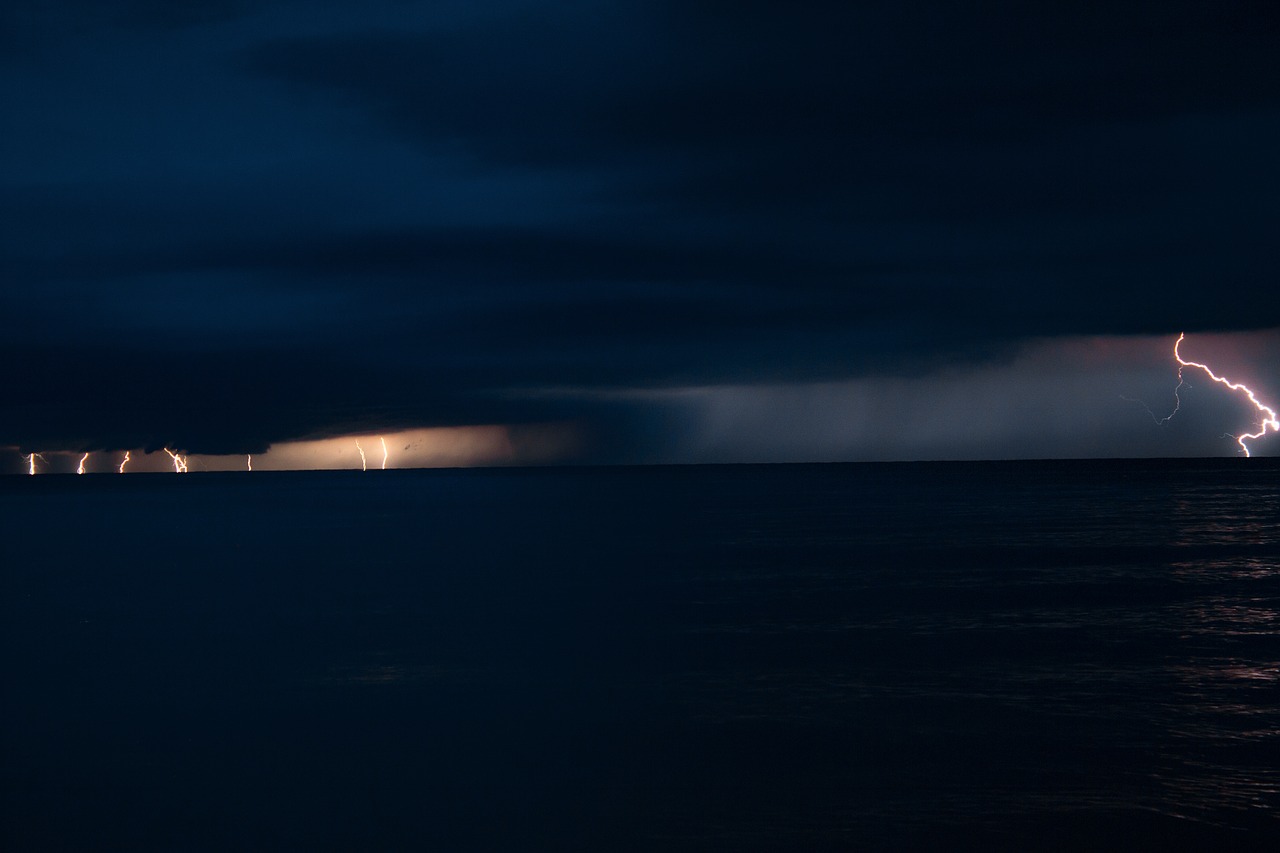 thunderstorm sea clouds free photo