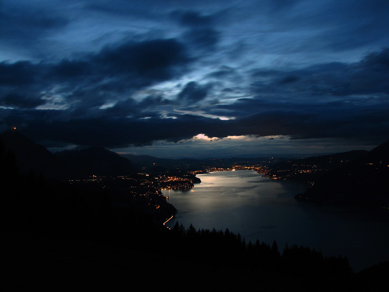 thunersee in the evening at night free photo