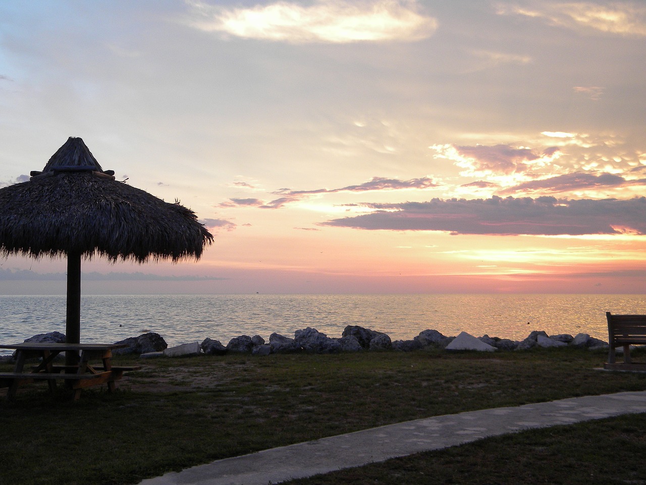 tiki hut at sunset florida keys ocean free photo