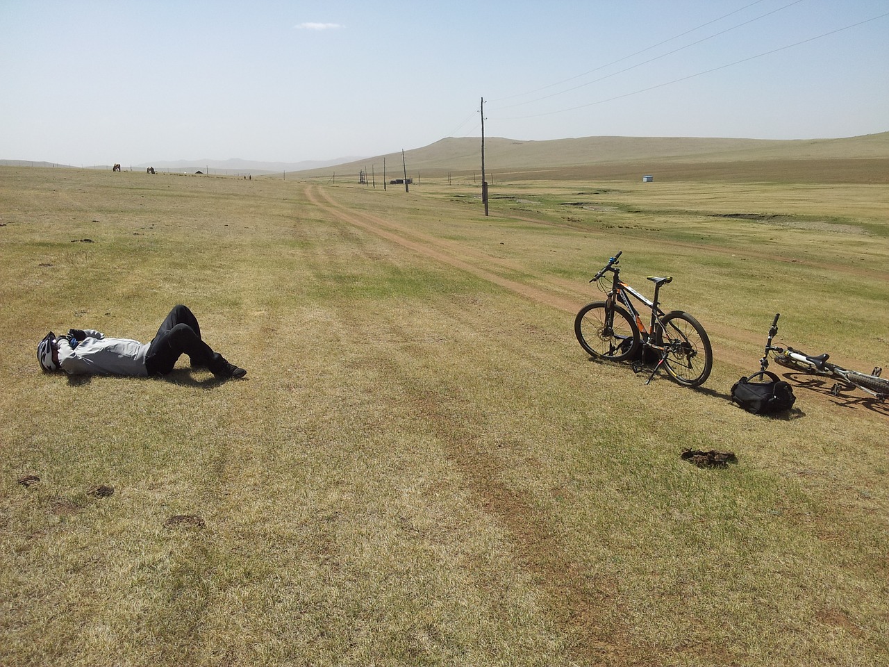 tired bicyclist mongolia free photo