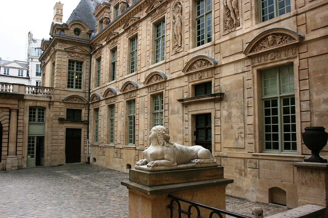 to sully hotel facade of building paris free photo