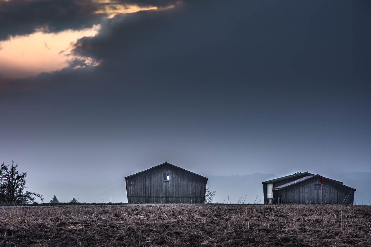 tobacco barns dark sky landscape free photo