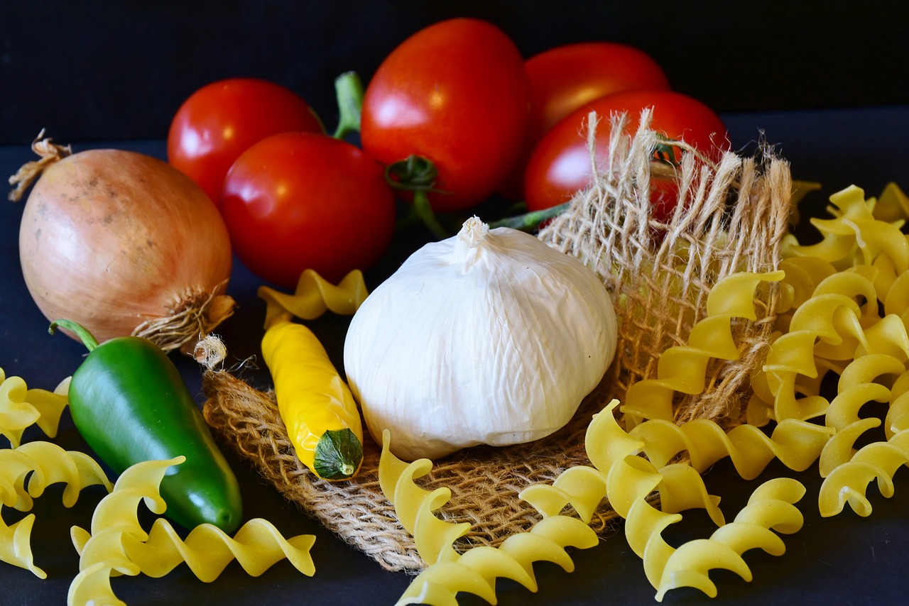 tomatoes  noodles  pepperoni free photo