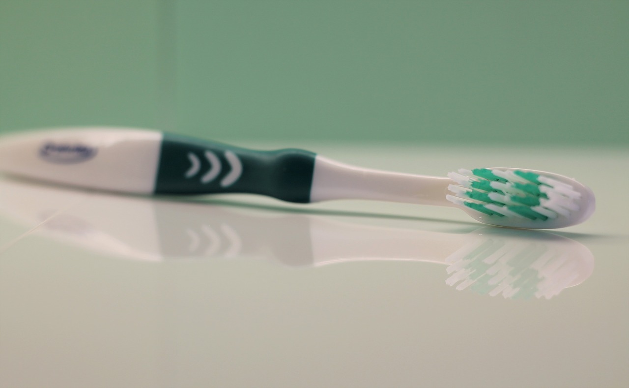 toothbrush green hygiene free photo