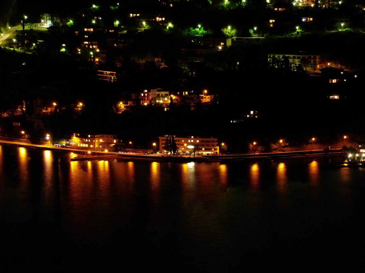 torbole at night coast line free photo