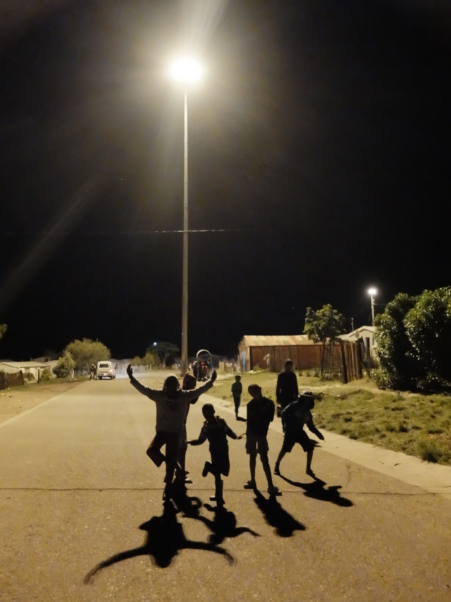 township,children playing,children posing,mast lighting,night scene - free image from needpix.com