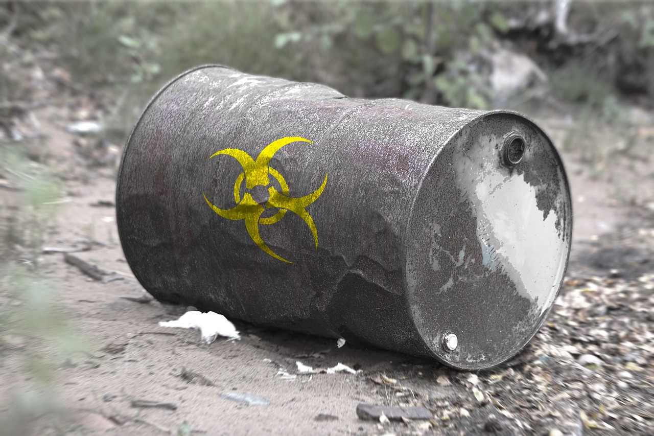 toxic waste barrel broken free photo