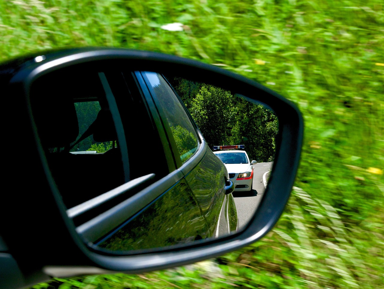 tracking police rear mirror free photo