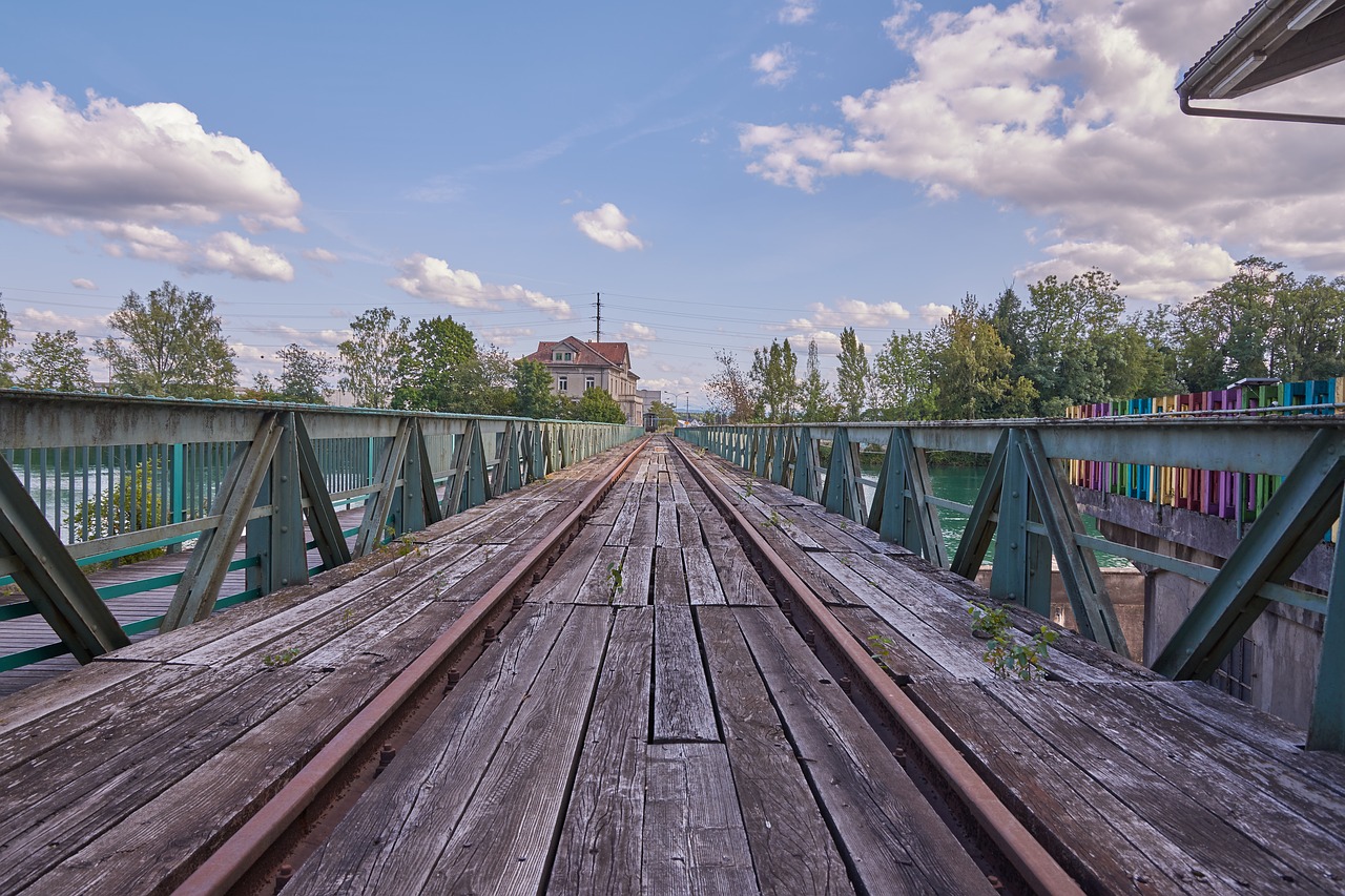 tracks clouds bridge free photo