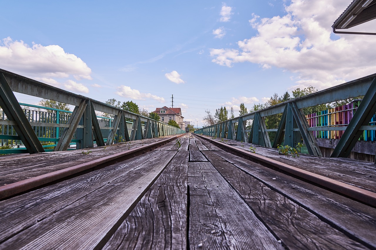 tracks clouds bridge free photo