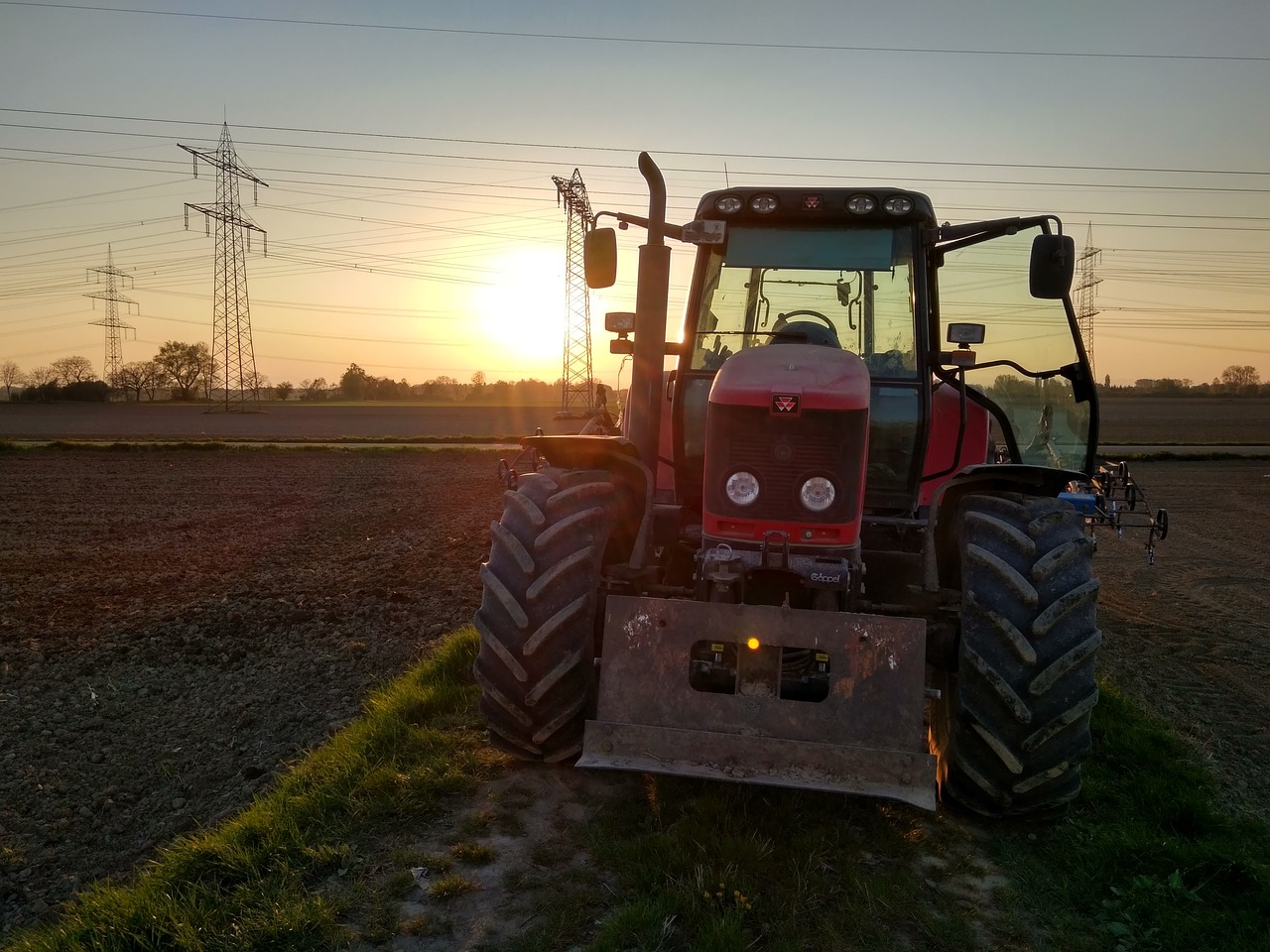 tractor sunset agriculture free photo