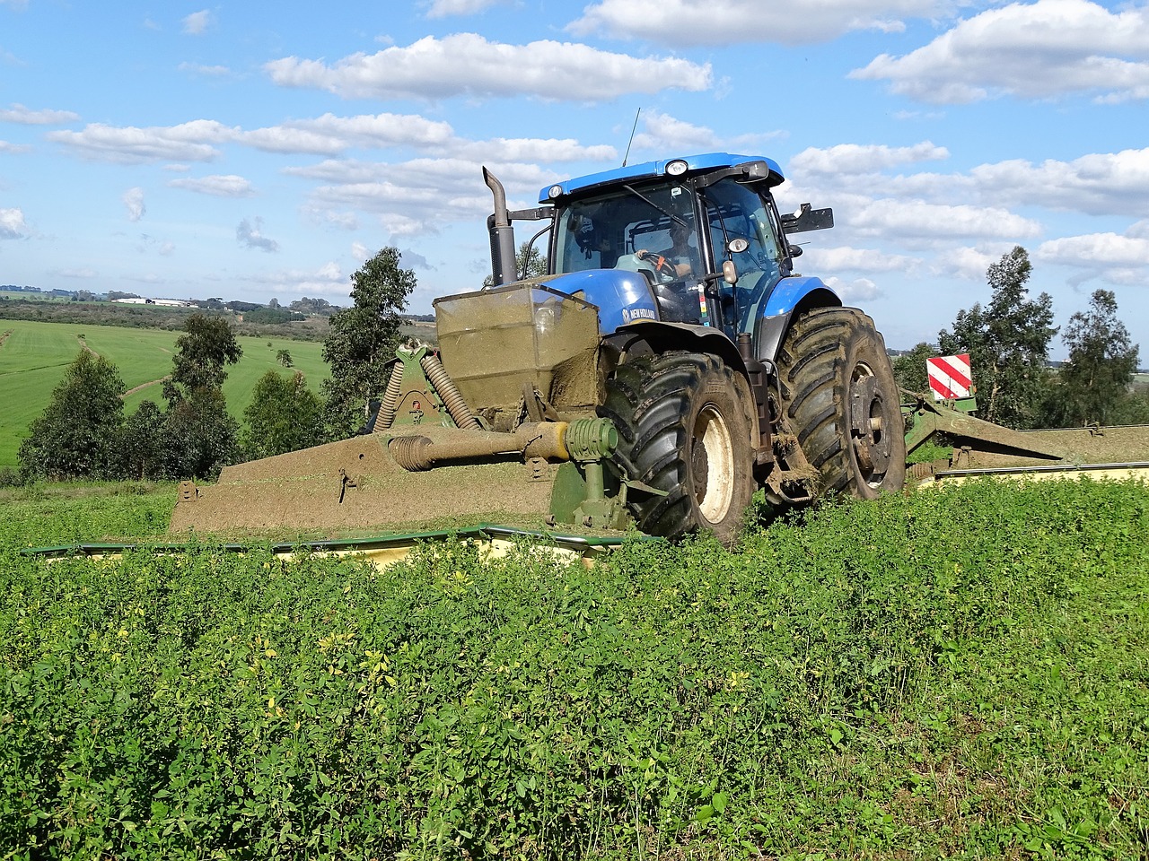 tractor plantation clouds free photo