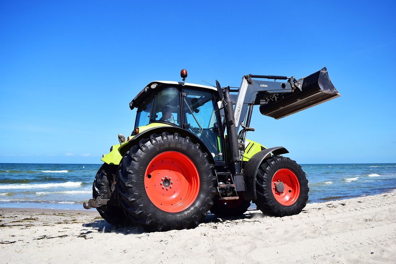 tractor  most beach  baltic sea free photo