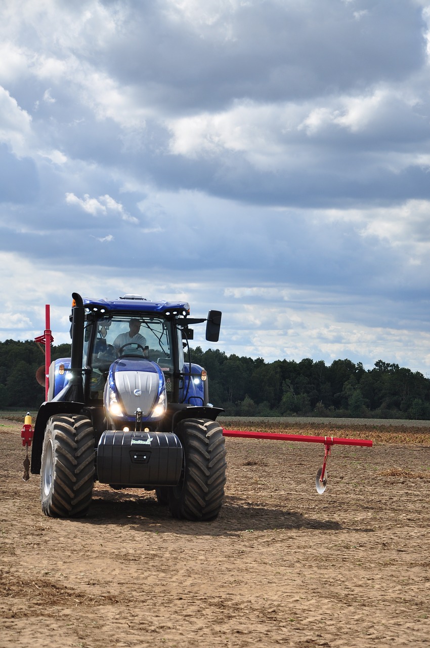 tractor  agriculture  the cultivation of free photo