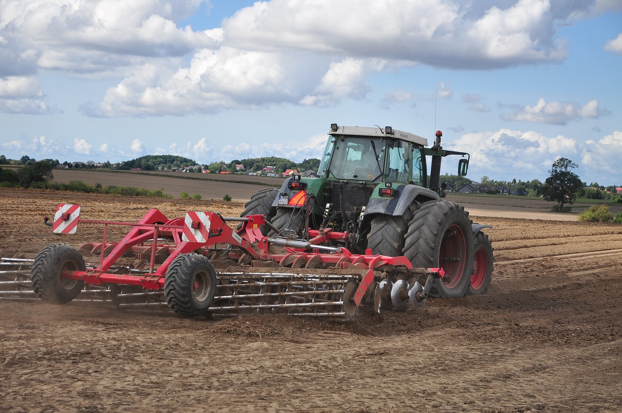 tractor  agriculture  the cultivation of free photo