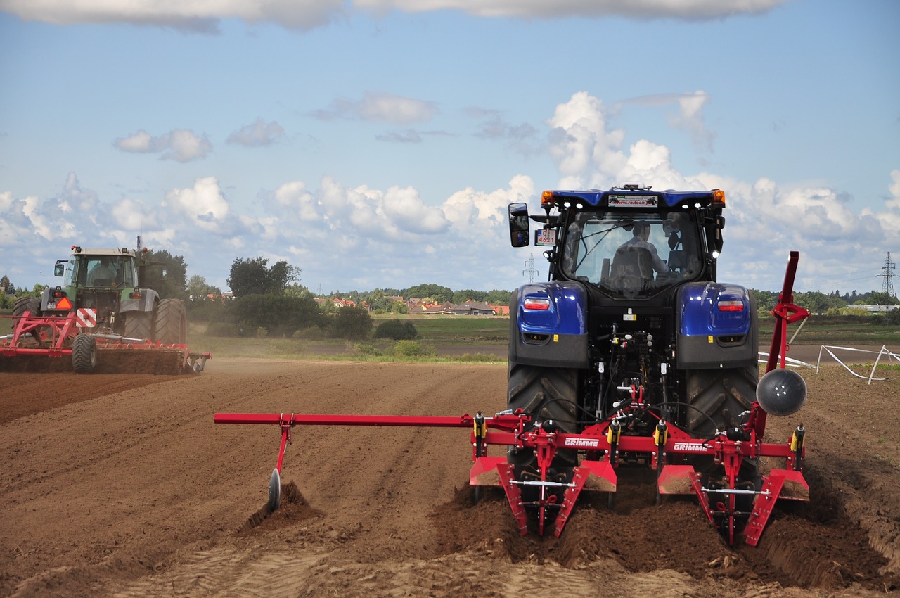 tractor  agriculture  the cultivation of free photo