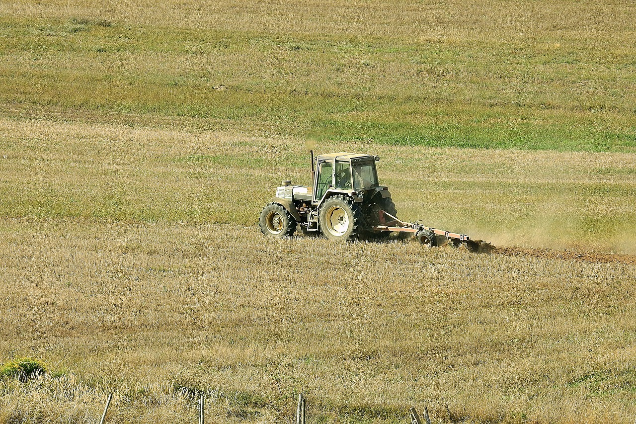 tractor  agriculture  plow free photo