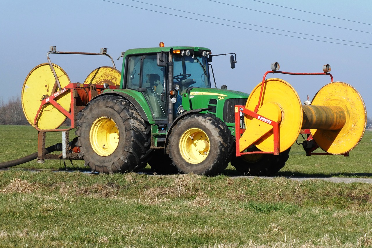 tractor  agricultural machinery  grassland free photo