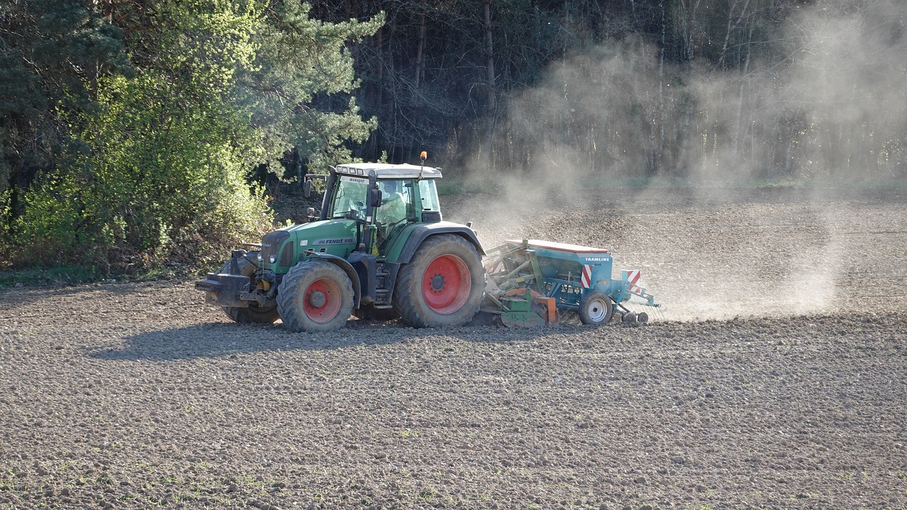 tractor  seeds  farmer free photo