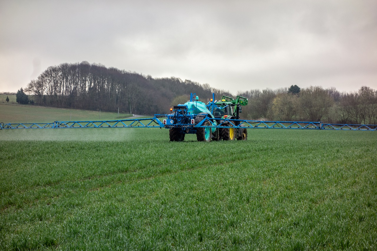 tractor  fertilizer  pesticide free photo