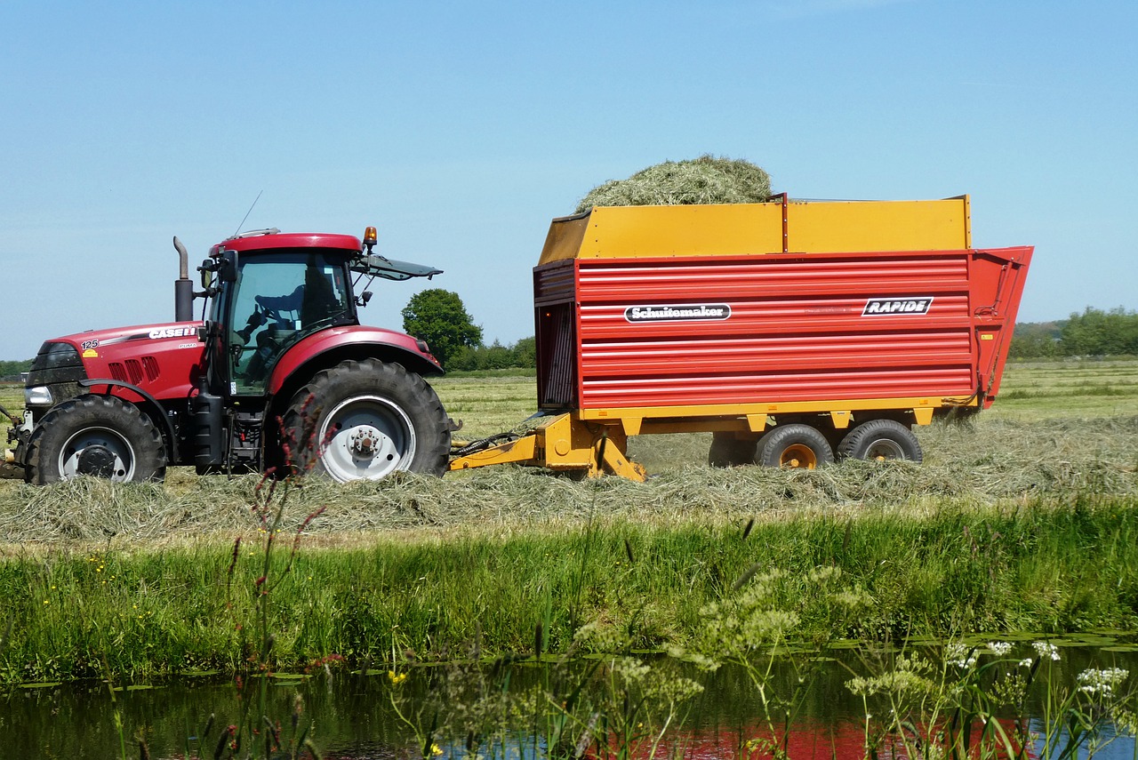 tractor  agricultural machinery  grassland free photo