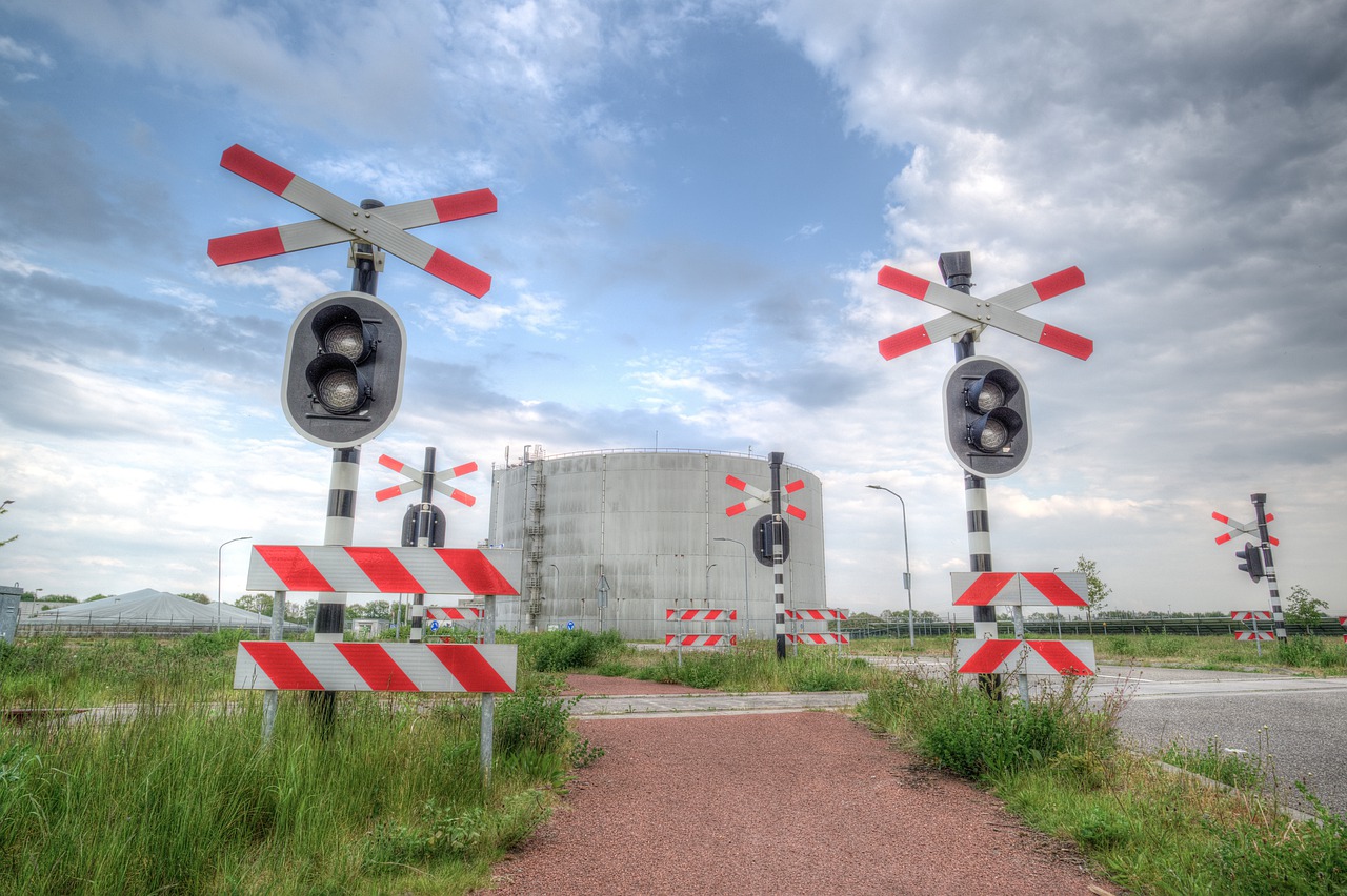 train  crossing  silo free photo