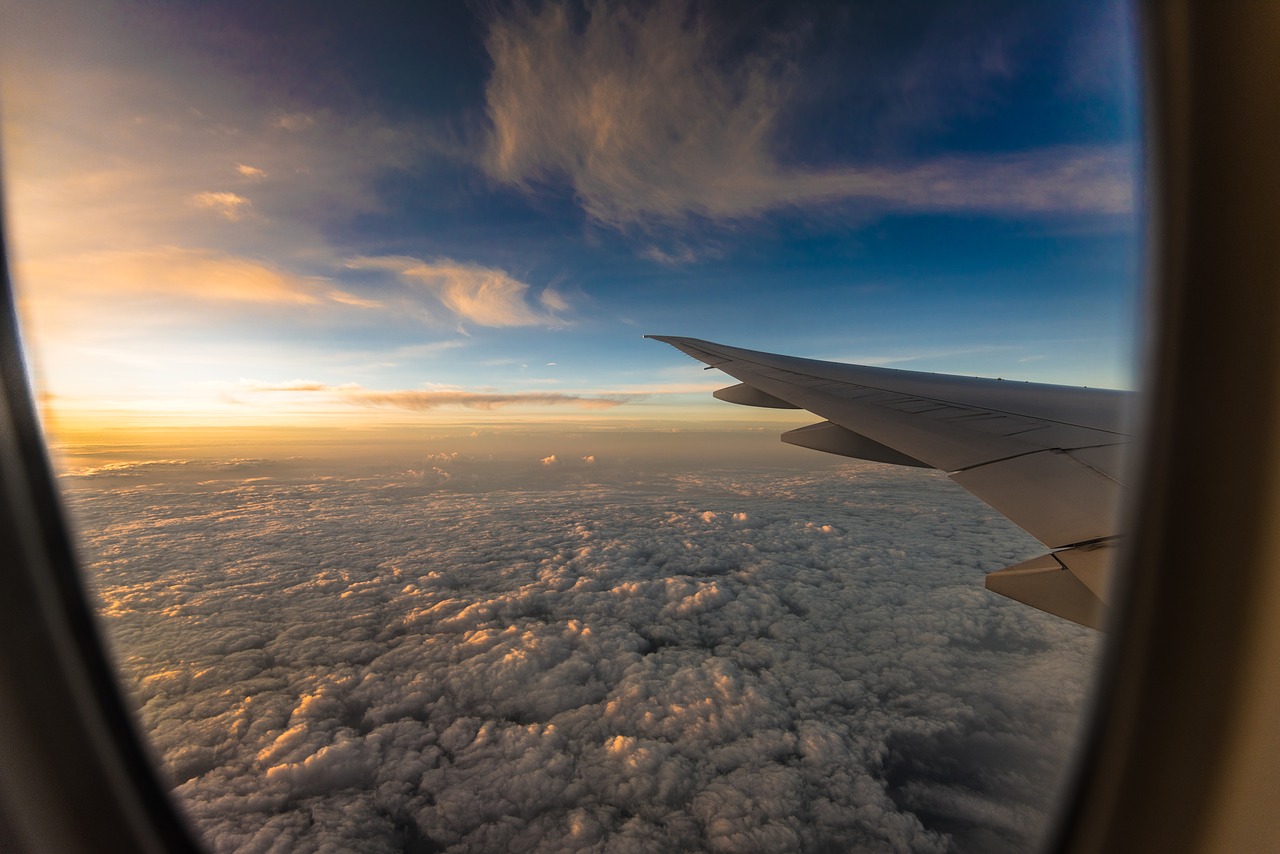 travel plane sunset free photo