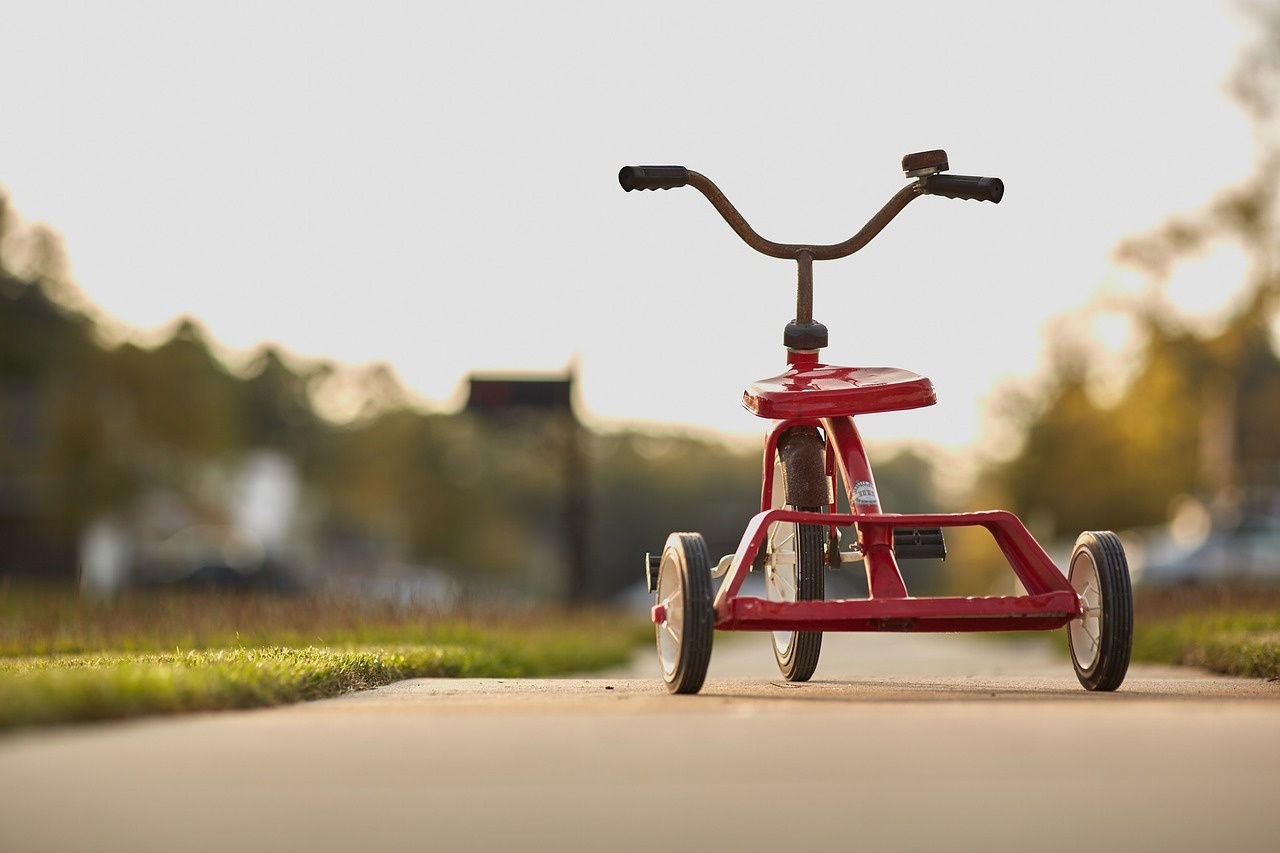 tricycle red childhood free photo