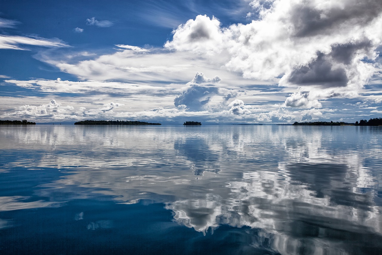 tropical sea cloud reflection free photo