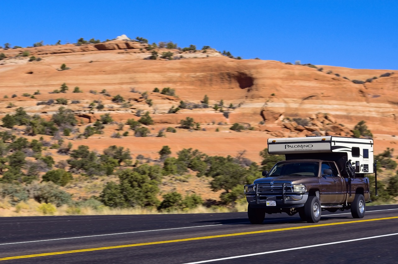 truck camper stop action  blur  truck free photo