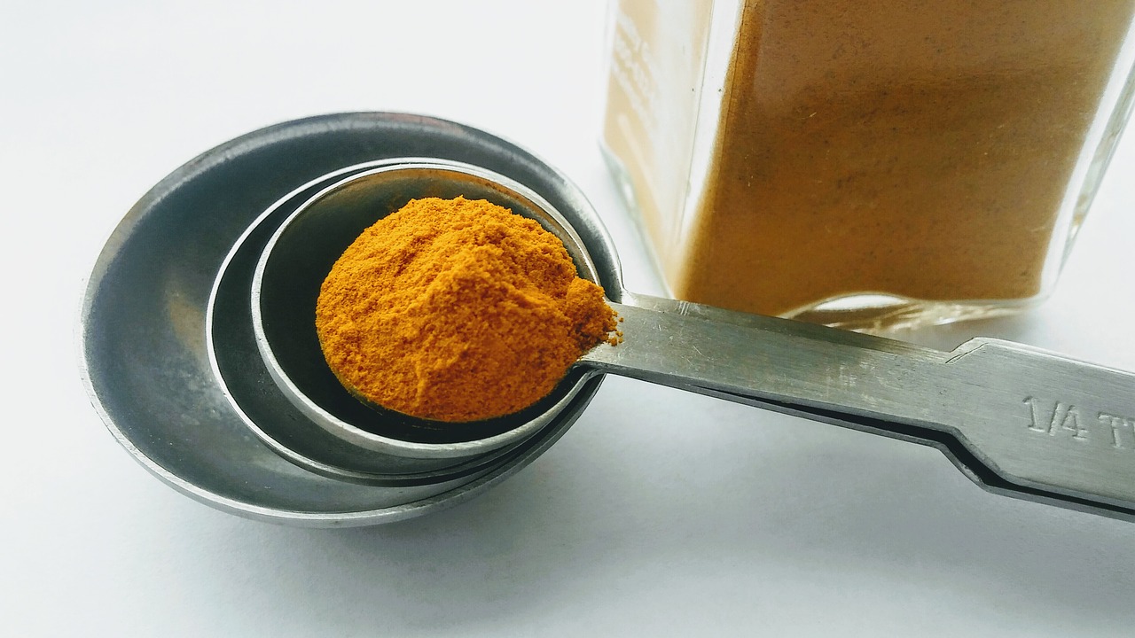 turmeric  spices  spoon free photo