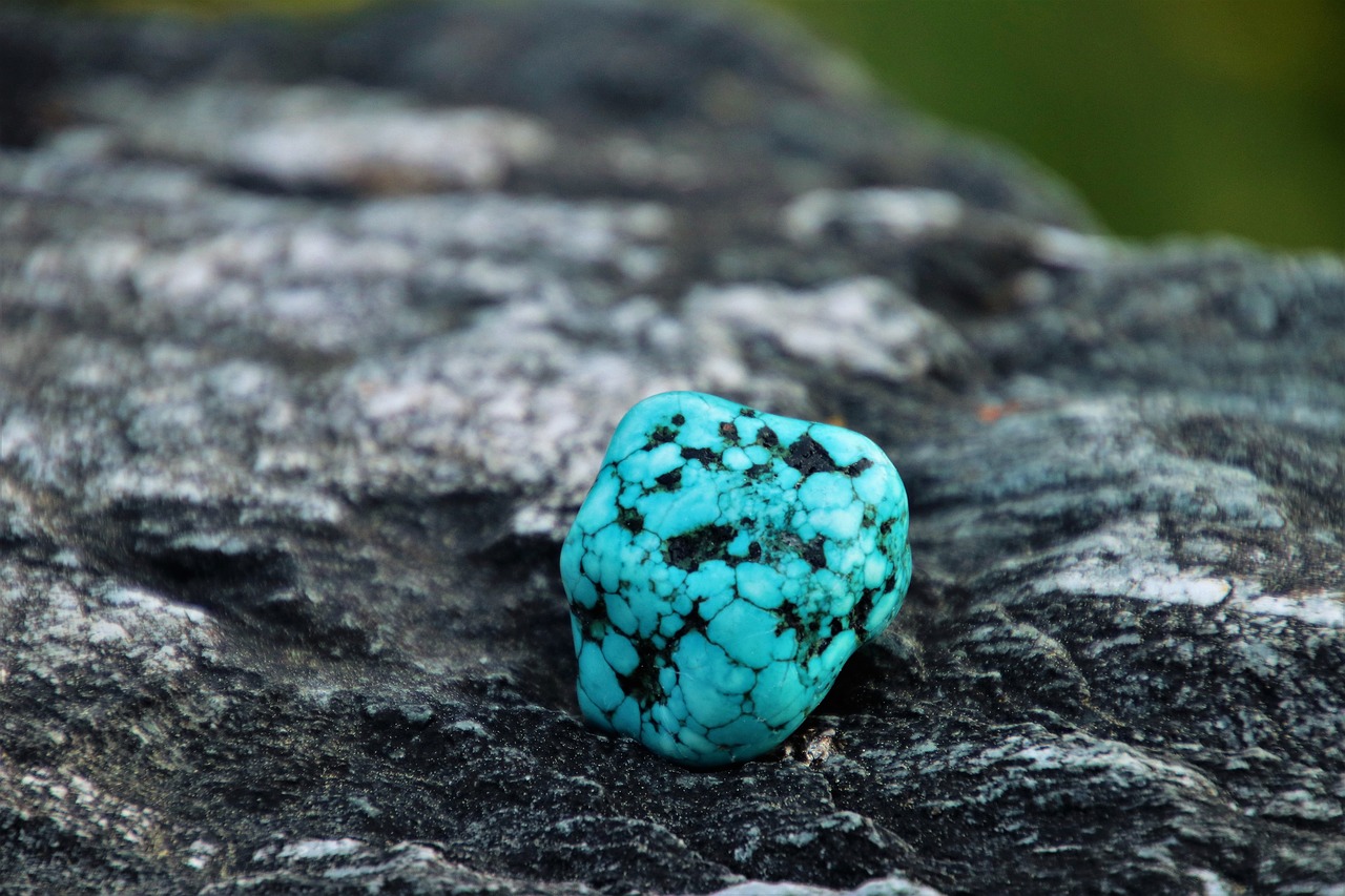 turquoise  amulet  rocks free photo