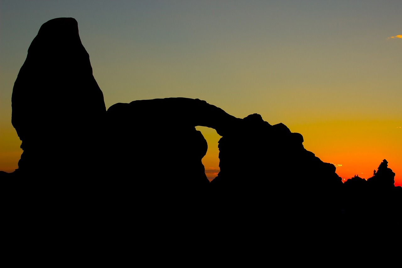 turret arch sunset landscape free photo