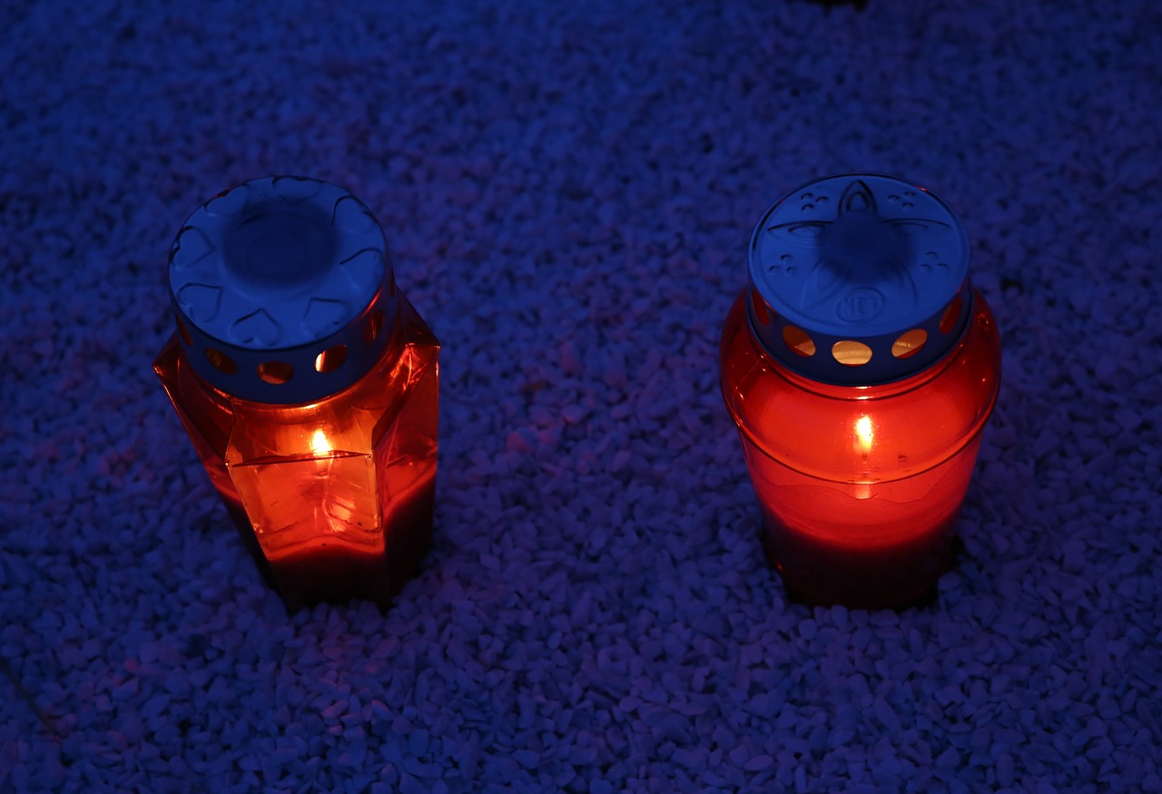 two red candles  lantern  illumination free photo