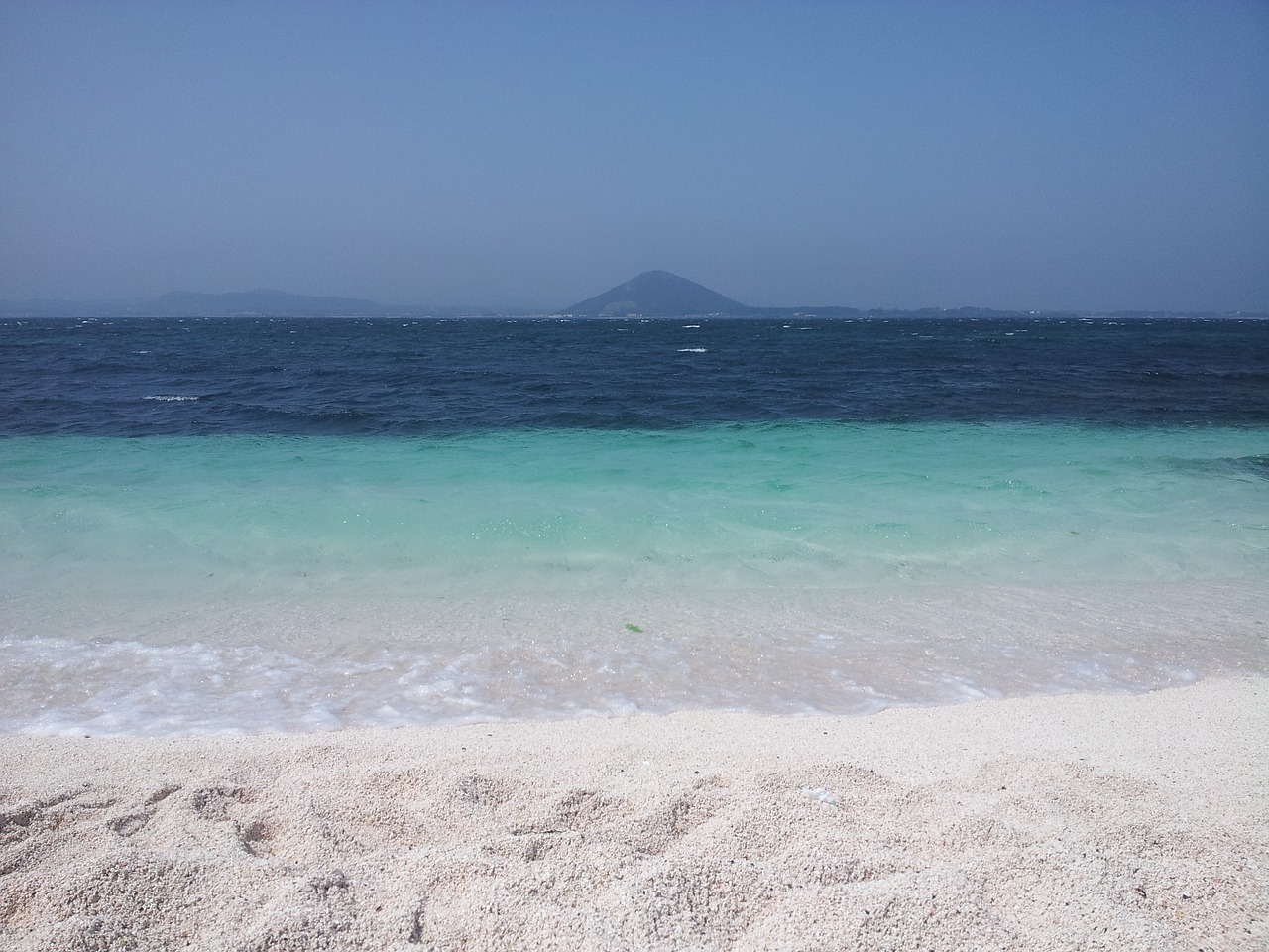 udo white sandy beach sea free photo