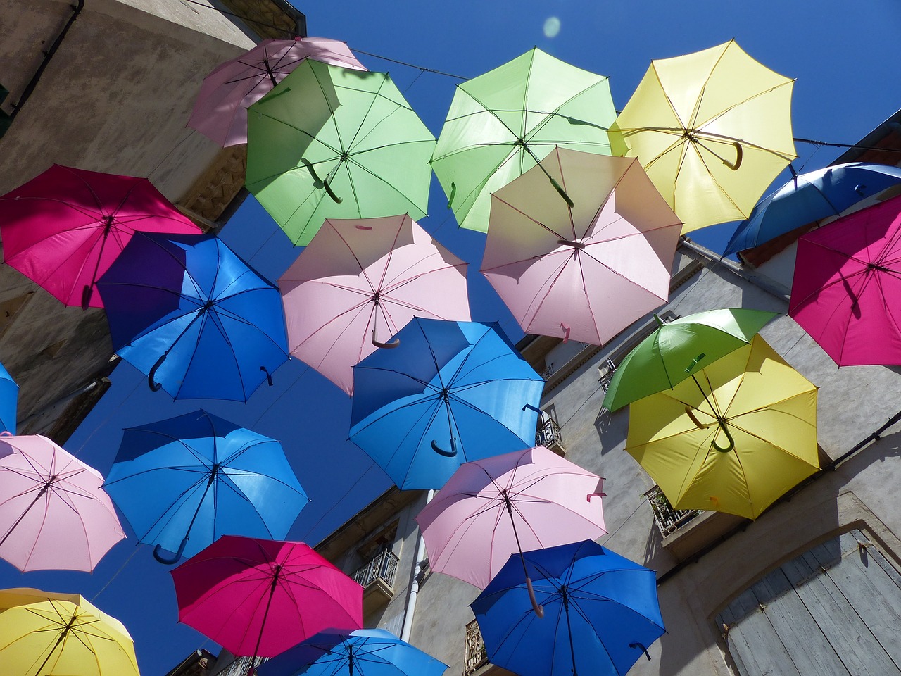 umbrellas colorful blue sky free photo