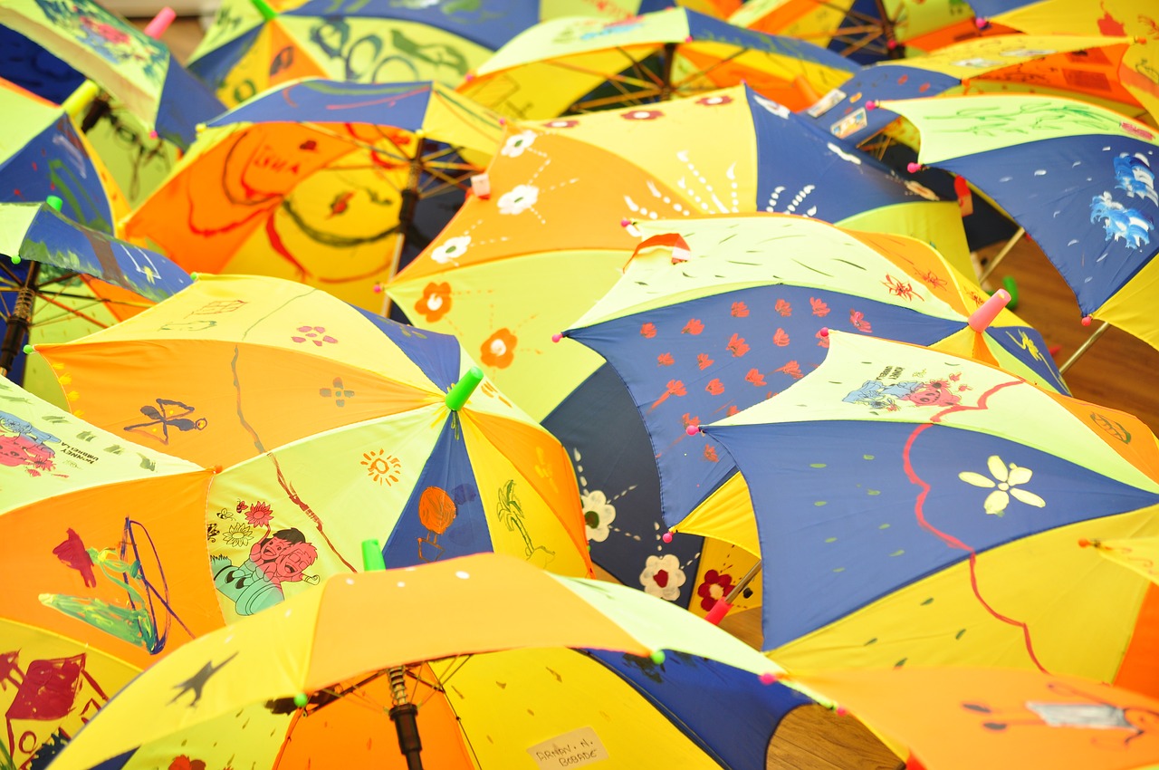 umbrellas  kids painting  colorful free photo