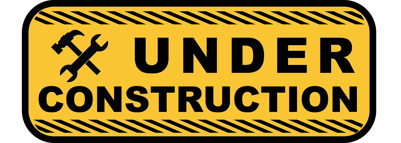 under construction construction sign free photo