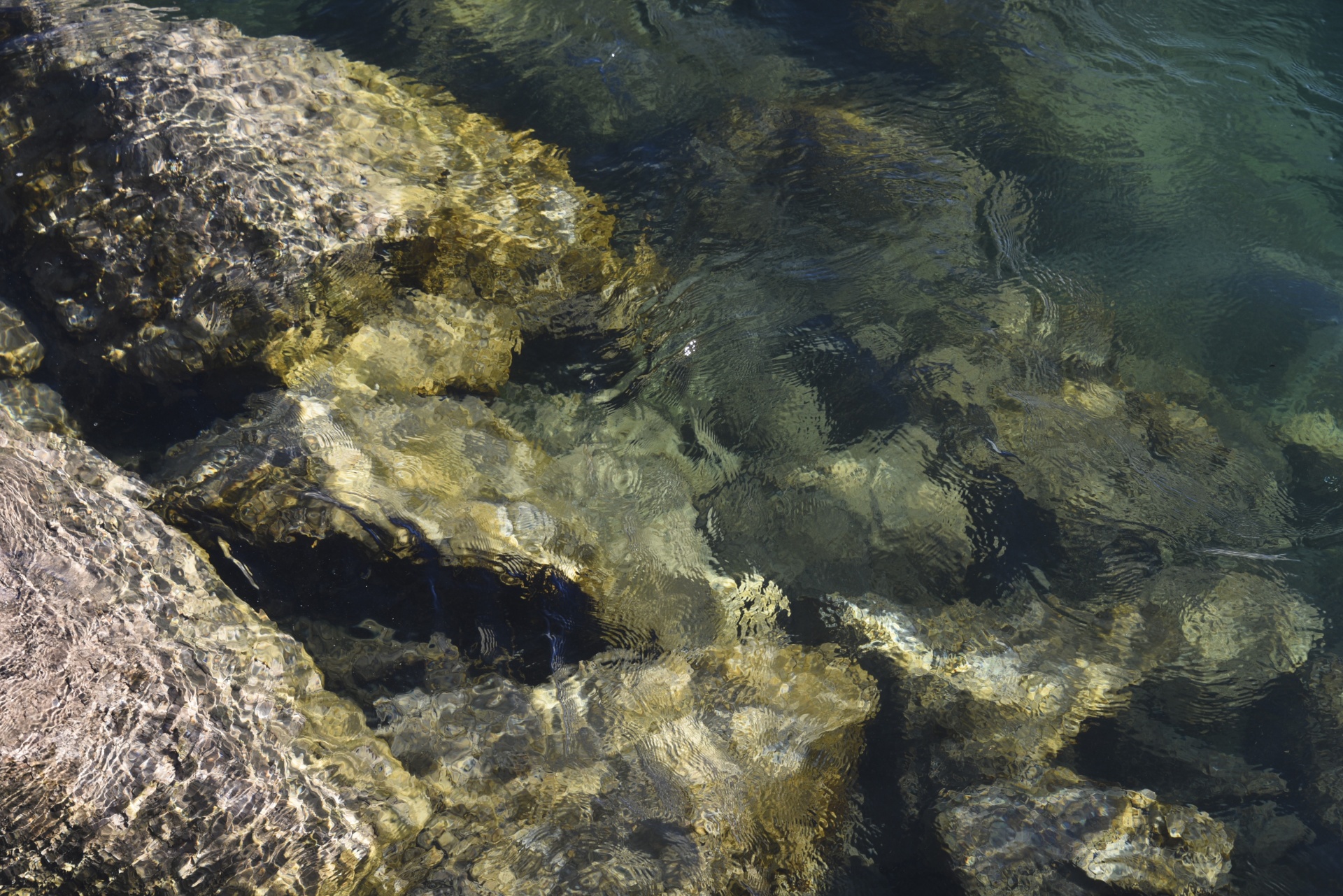 rocks rippled water free photo