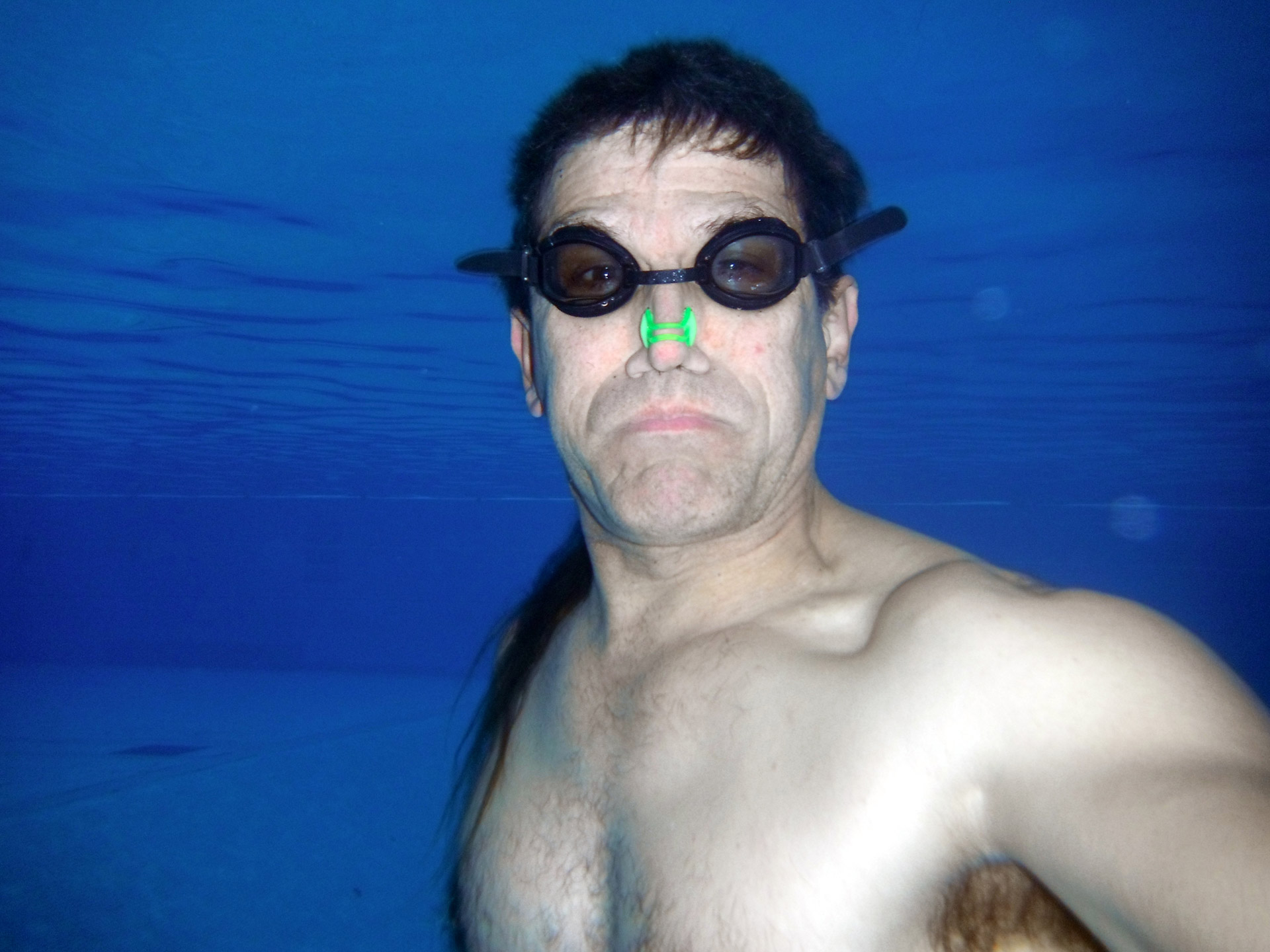 underwater swimming man free photo